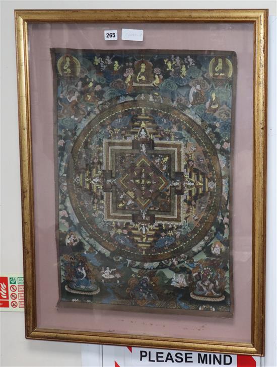 A framed 20th century thangka, 24.5in x 17.25in.